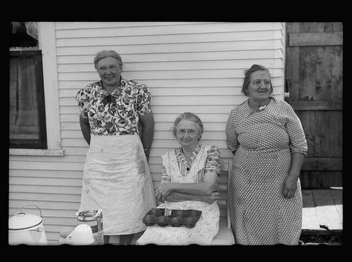 Ladies who are serving lunch at auction near Tenstrike, Minnesota