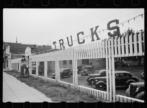 Untitled photo, possibly related to: Paul Bunyan at used car lot, Bemidji, Minnesota