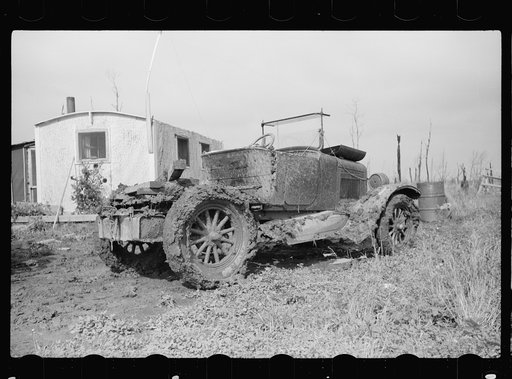 House and automobile belonging to farmer of cut-over area, Lake of the Woods County, Minnesota