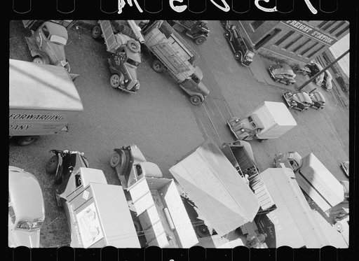 Untitled photo, possibly related to: Family of trucker waiting while truck is being loaded, Minneapolis, Minnesota