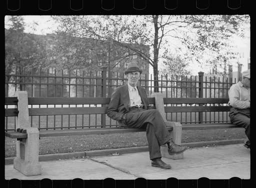 Man on park bench, Gateway District, Minneapolis, Minnesota