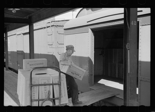 Untitled photo, possibly related to: Trucks at terminal warehouse, Minneapolis, Minnesota