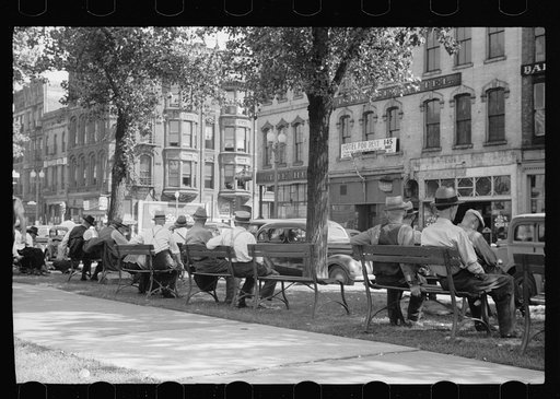 Men sitting in the park, Gateway District, Minneapolis, Minnesota