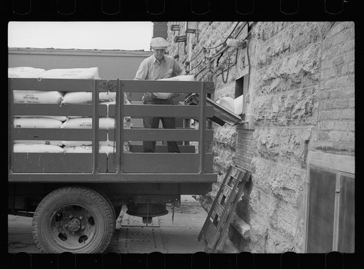 Loading truck with flour at Pillsbury mill, Minneapolis, Minnesota