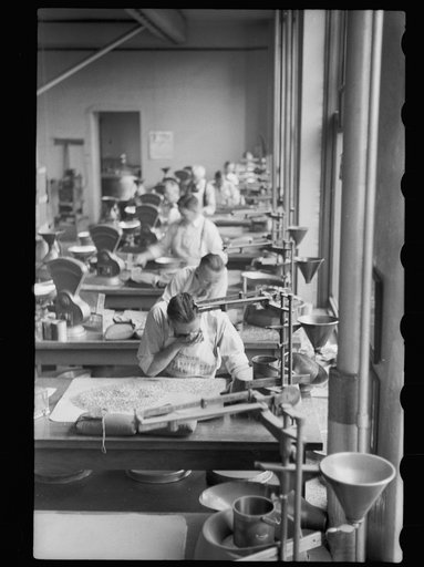 Untitled photo, possibly related to: Testing for impurities in wheat at Minnesota grain inspection dept., Minneapolis, Minnesota