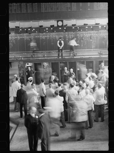 Untitled photo, possibly related to: Grain exchange, Minneapolis, Minnesota. Pit on right, telegraph office on left