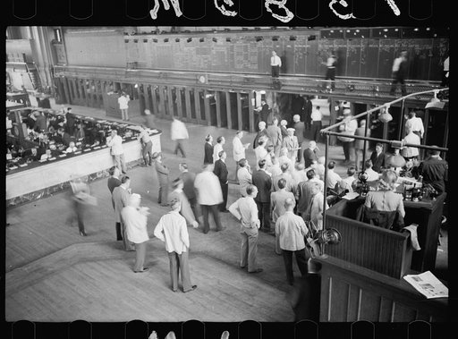 Untitled photo, possibly related to: Grain exchange, Minneapolis, Minnesota. Pit on right, telegraph office on left