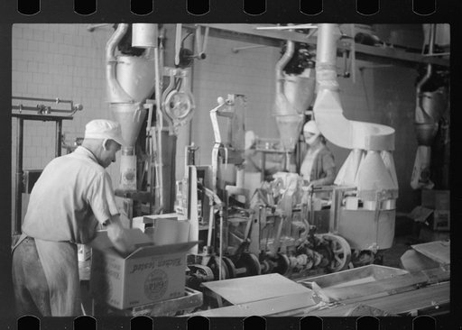 Untitled photo, possibly related to: Packing flour, Pillsbury mills, Minneapolis, Minnesota