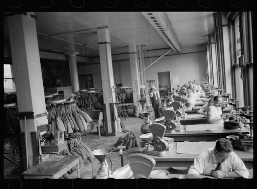 Untitled photo, possibly related to: Licensed grain inspector testing wheat for impurities, Minneapolis, Minnesota