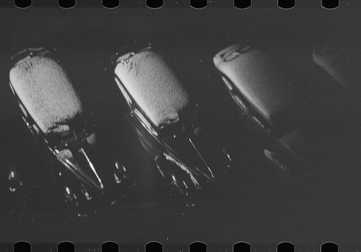 Untitled photo, possibly related to: Automobiles after light snow fall, Dubuque, Iowa