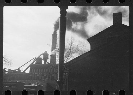 Untitled photo, possibly related to: Parochial school children playing in front of church, before the school bell, Dubuque, Iowa