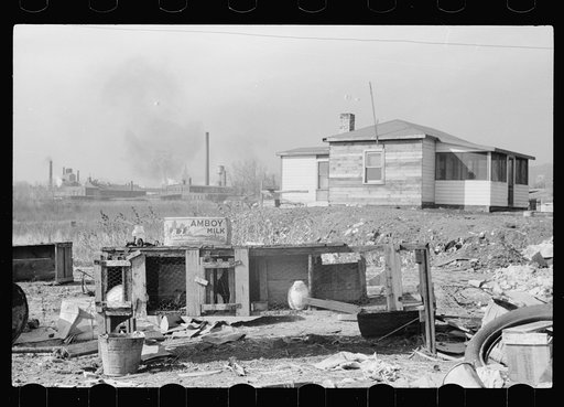 Many residents of this shacktown keep a cow or a few chickens. Dubuque, Iowa