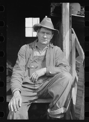 Untitled photo, possibly related to: Resident of river bottoms shacktown. Dubuque, Iowa