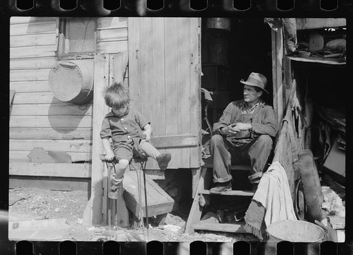 Untitled photo, possibly related to: Resident of river bottoms shacktown. Dubuque, Iowa