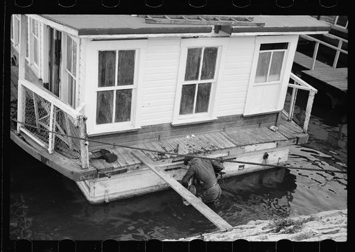 Attaching propeller to river boat, Dubuque, Iowa