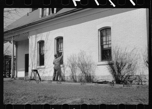 Washing windows, Dubuque, Iowa
