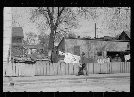 Untitled photo, possibly related to: Workman going home, Dubuque, Iowa