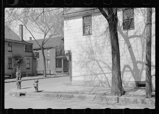 Untitled photo, possibly related to: Workman going home, Dubuque, Iowa