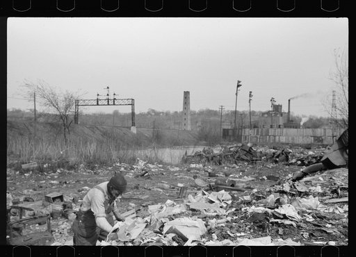 Untitled photo, possibly related to: Foraging for food, city dump, Dubuque, Iowa. Produce houses dump apples, grapefruit, etc., which are not quite bad