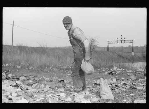 Foraging for food, city dump, Dubuque, Iowa. Produce houses dump apples, grapefruit, etc., which are not quite bad