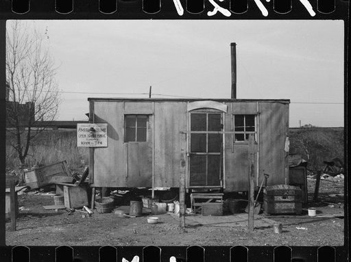Untitled photo, possibly related to: Shack on the edge of the city dump, Dubuque, Iowa