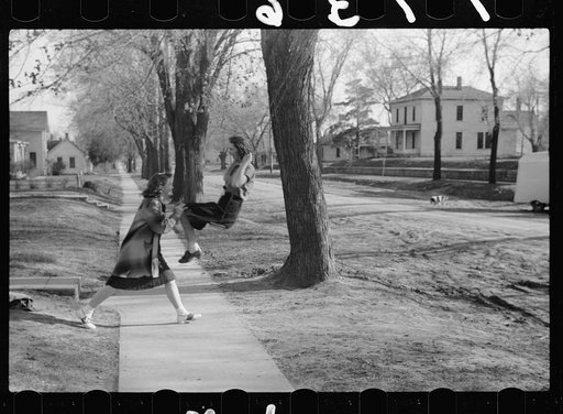 Untitled photo, possibly related to: Girl swinging, Woodbine, Iowa