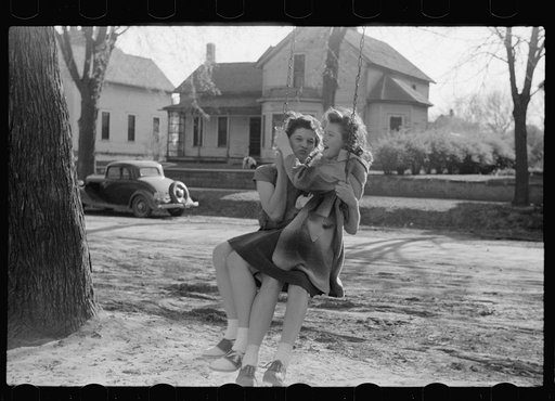 Untitled photo, possibly related to: Girl swinging, Woodbine, Iowa