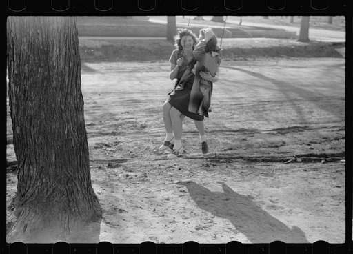 Untitled photo, possibly related to: Girl swinging, Woodbine, Iowa