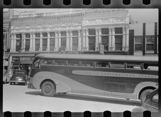 Untitled photo, possibly related to: Bus going through Denison, Iowa