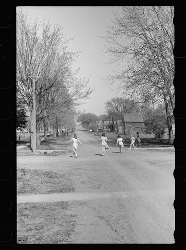 Children playing in the street, Woodbine Iowa