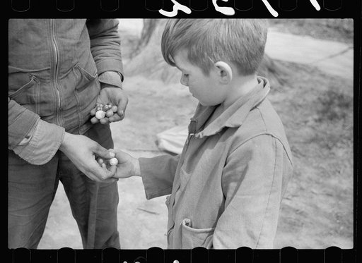 Boys in marble game, Woodbine, Iowa