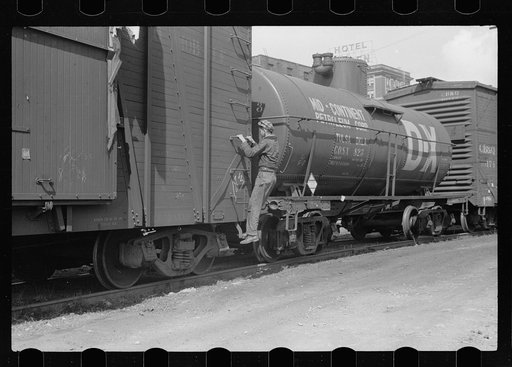 Untitled photo, possibly related to: Boy hopping freight train, Dubuque, Iowa
