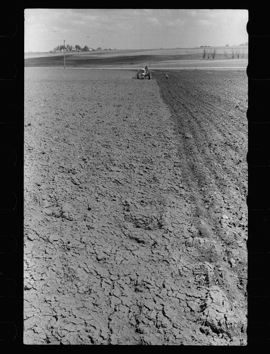 Untitled photo, possibly related to: Boy operating tractor, Grundy County, Iowa