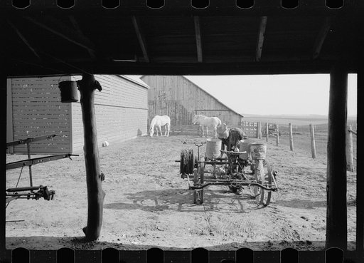 Oiling planter preparatory to corn planting, Jasper County, Iowa