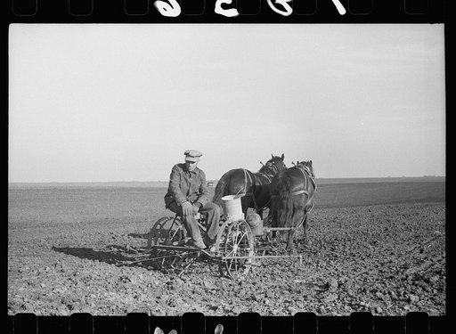 Untitled photo, possibly related to: Oiling planter preparatory to corn planting, Jasper County, Iowa