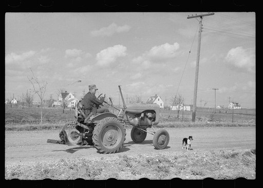 Untitled photo, possibly related to: Cooperatively-owned tractor at Granger Homesteads, Iowa