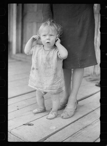 Untitled photo, possibly related to: Child of Ozark Mountains farmer, Missouri