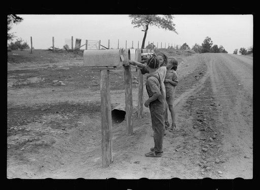 Untitled photo, possibly related to: Ozark children getting mail from RFD box, Missouri