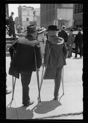 Two one-legged men outside church on Sunday morning, St. Louis, Missouri