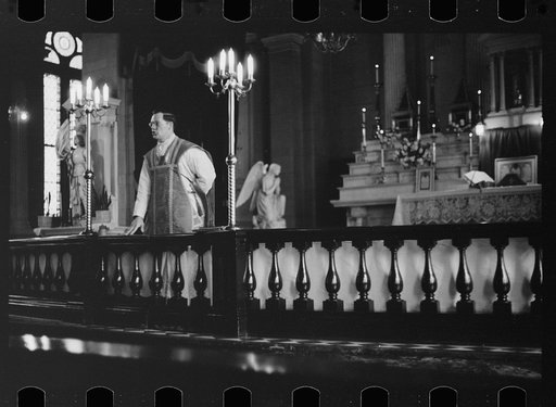 Priest delivering sermon, St. Louis, Missouri