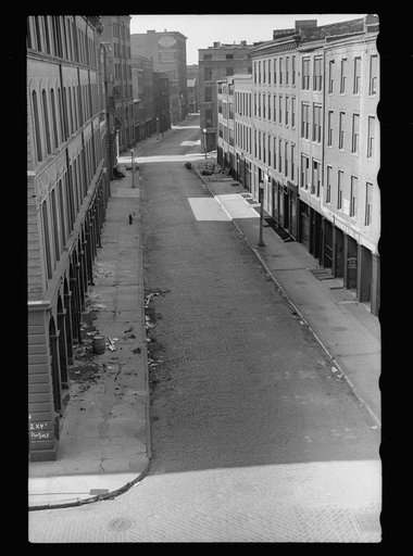 Street in oldest part of town which is being torn down, St. Louis, Missouri