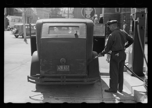 Untitled photo, possibly related to: Auto of migrant fruit worker at gas station, Sturgeon Bay, Wisconsin