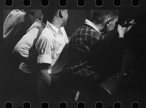 Untitled photo, possibly related to: Boy shooting during carnival at firemens' convention, Sturgeon Bay, Wisconsin
