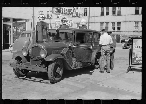 Untitled photo, possibly related to: Auto of migrant fruit worker at gas station, Sturgeon Bay, Wisconsin