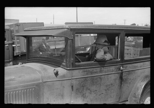 Untitled photo, possibly related to: Visitor at fruit market, Benton Harbor, Michigan