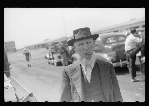 Untitled photo, possibly related to: Visitor at fruit market, Benton Harbor, Michigan