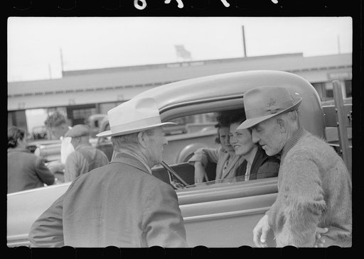 Untitled photo, possibly related to: Visitor at fruit market, Benton Harbor, Michigan