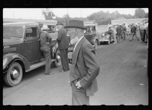 Visitor at fruit market, Benton Harbor, Michigan