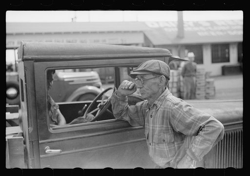 Farmer at produce market, Benton Harbor, Michigan