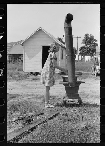 Untitled photo, possibly related to: Water supply for nine company cabins at fruit packing plant, Berrien County, Michigan